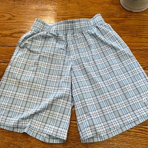 Warrior brand blue plaid men’s athletic shorts.  Size Small.